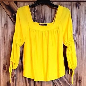 Women's size Medium,  yellow blouse